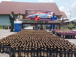 Polres Asmat Press Release Pemusnahan Ribuan Botol Minuman Keras
