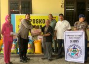Kapolres Jayawijaya Terima Bantuan Dari KKMP Untuk Korban Kebakaran