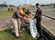 Polri Lakukan Bersih-bersih Usai Pesta Rakyat di Monas
